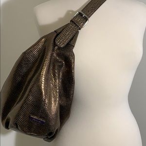 Calvin Klein metallic bronze reptile pattern hobo.